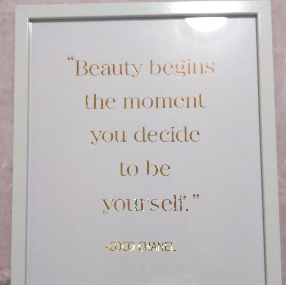 A Coco Chanel quote in a picture